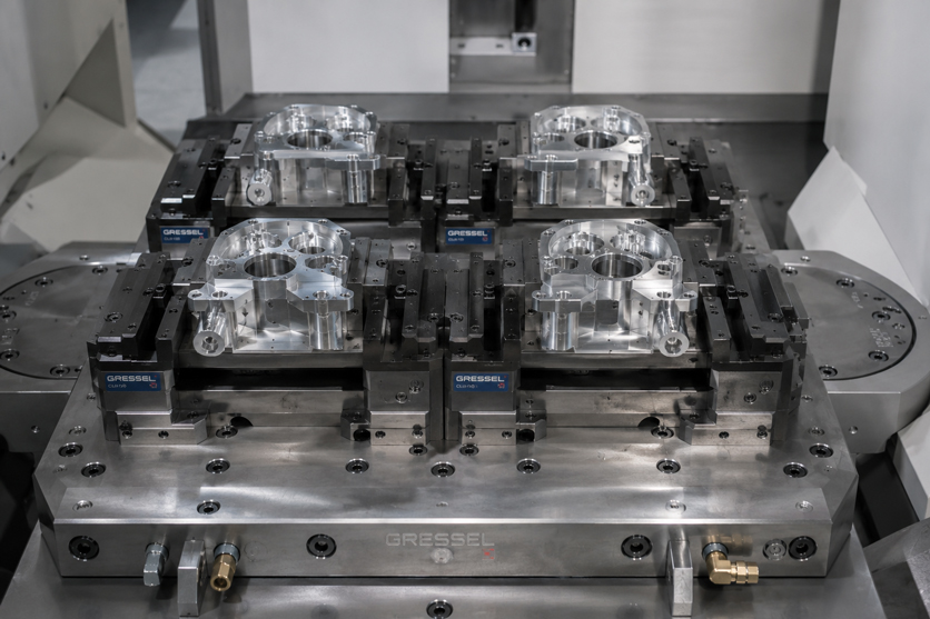 FIXTURE AND WORKHOLDING STRATEGIES FOR MULTI SETUP MACHINING