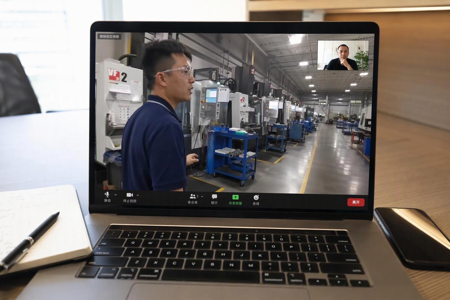 Live video walkthrough of a CNC machining workshop viewed from a laptop during a remote supplier check